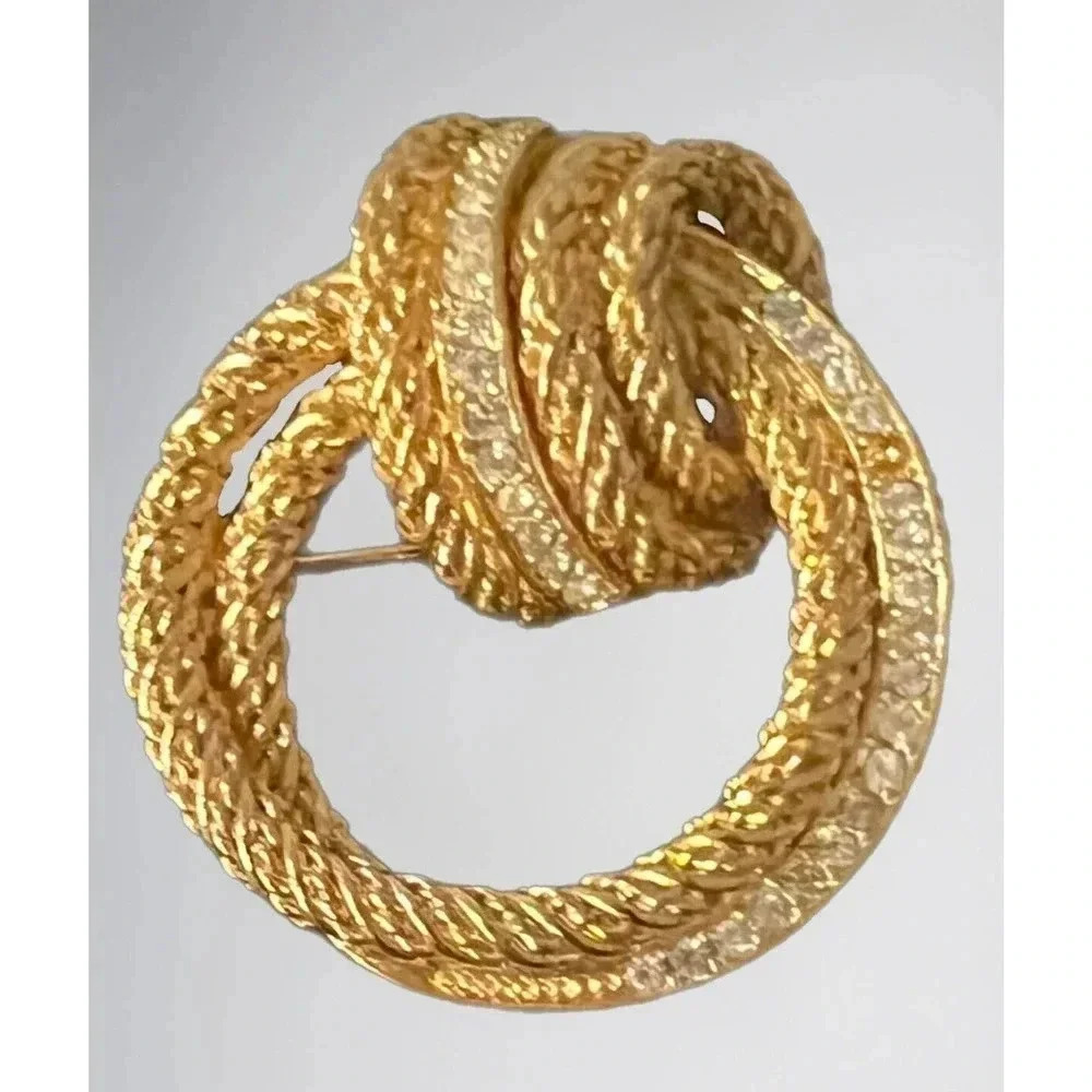 CHRISTIAN Dior Vintage Round Circle Knot Clear Rhinestone Gold Tone Brooch - Picture 2 of 6